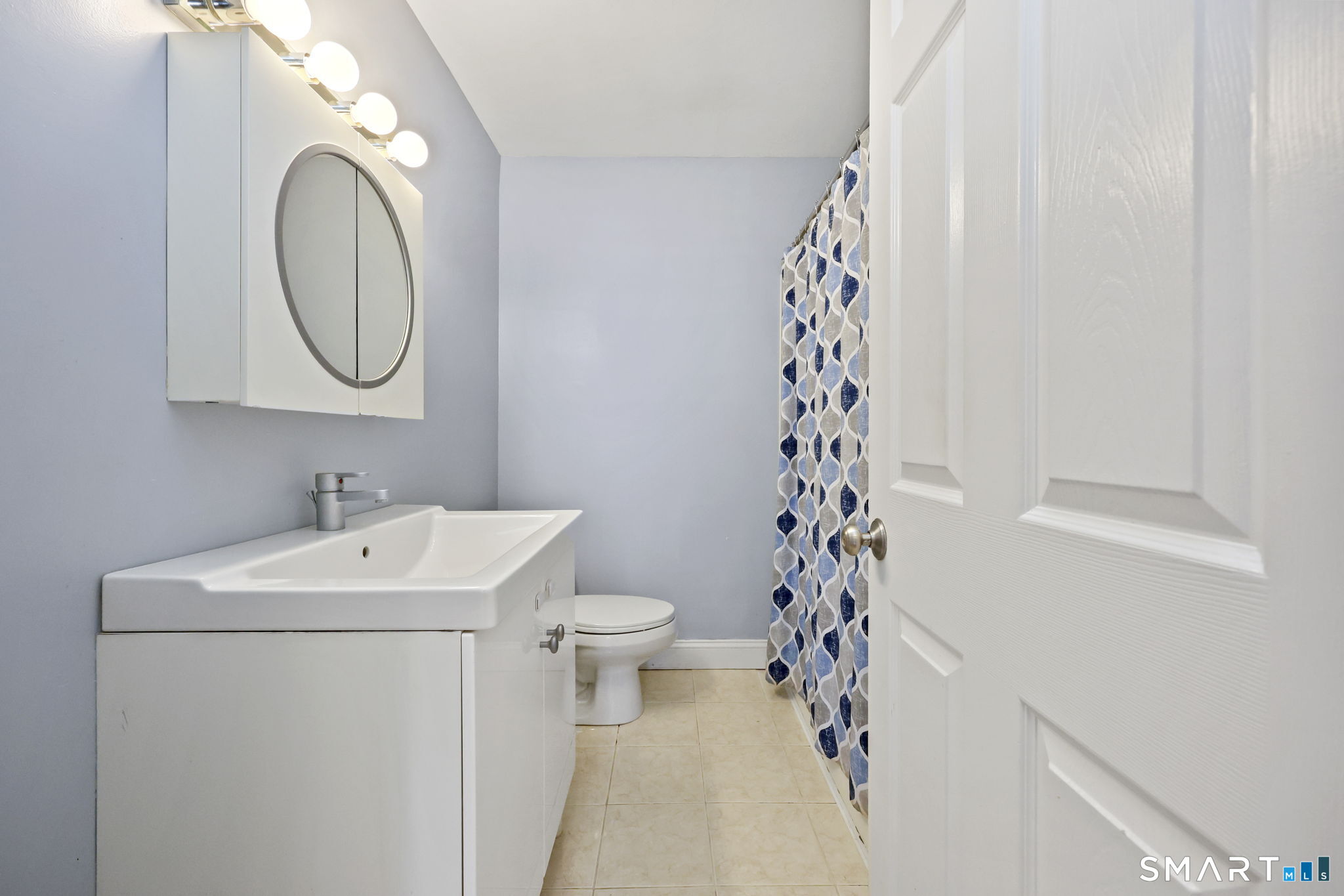 27 Lanesville Road New Milford, CT 06776 - Photo 34 of 38 a bathroom with a sink a toilet and a mirror