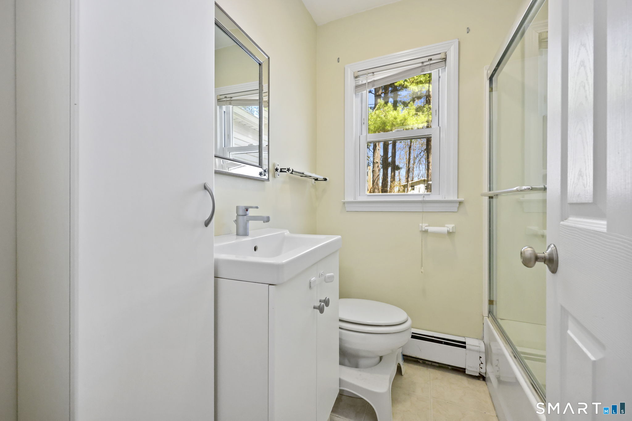 27 Lanesville Road New Milford, CT 06776 - Photo 35 of 38 a bathroom with a sink and a mirror