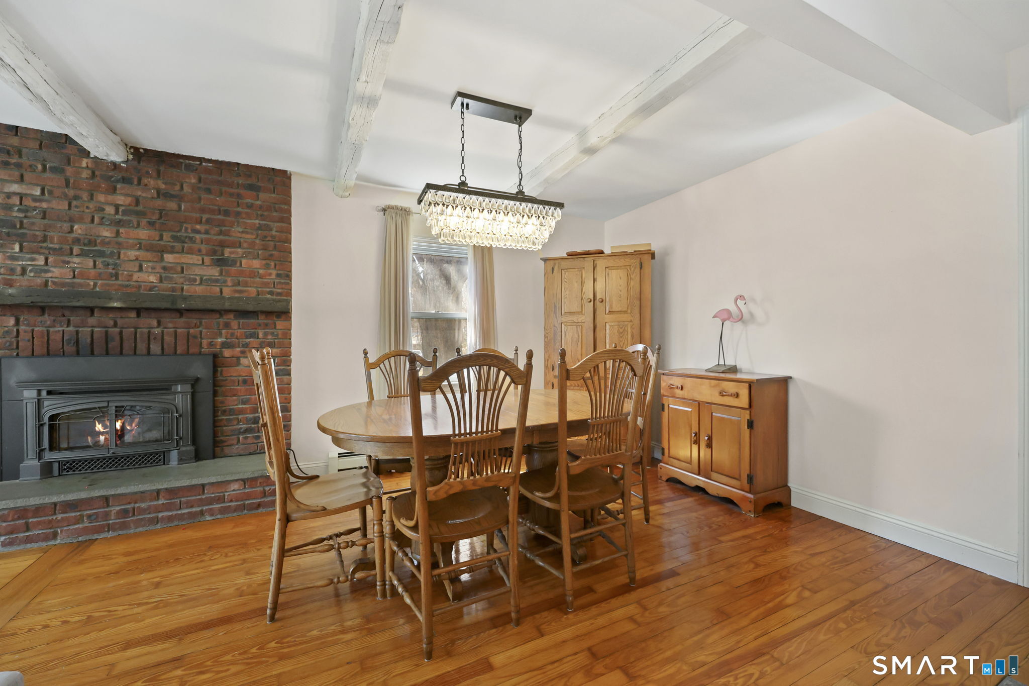 27 Lanesville Road New Milford, CT 06776 - Photo 7 of 38 a dining room with furniture window and wooden floor