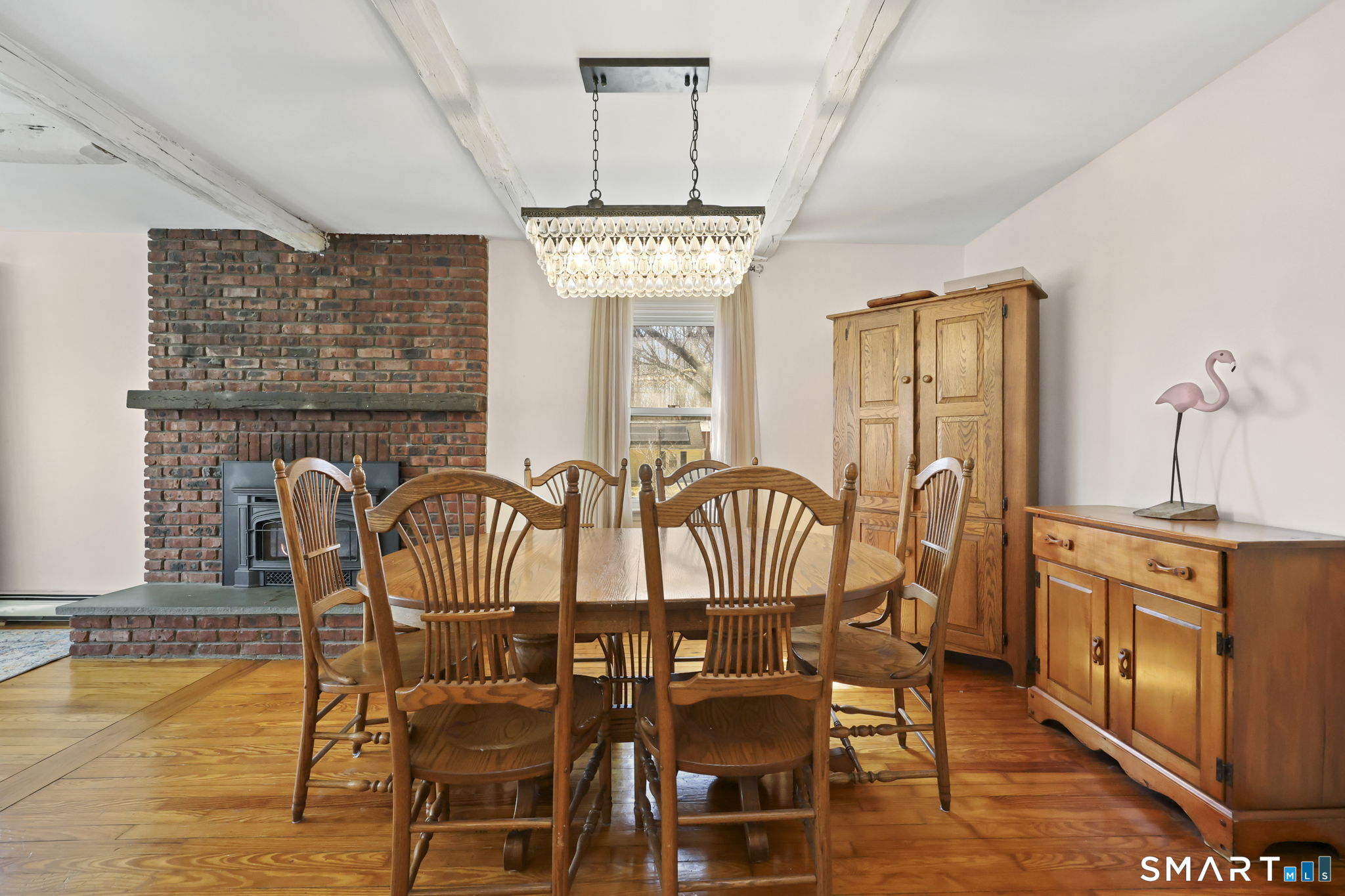 27 Lanesville Road New Milford, CT 06776 - Photo 8 of 38 a view of a dining room with furniture window and wooden floor