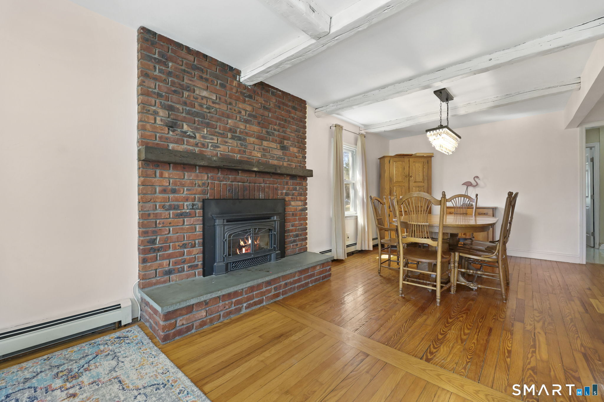 27 Lanesville Road New Milford, CT 06776 - Photo 10 of 38 a living room with furniture and a fireplace