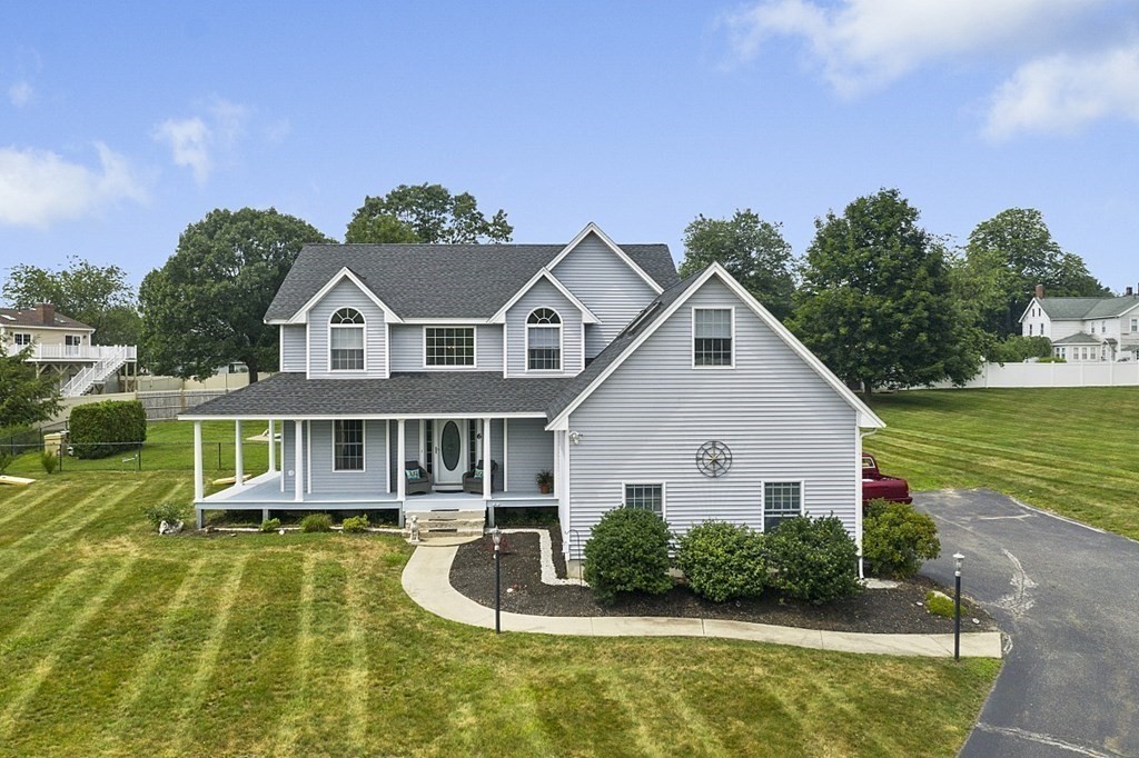 a view of a house with a swimming pool