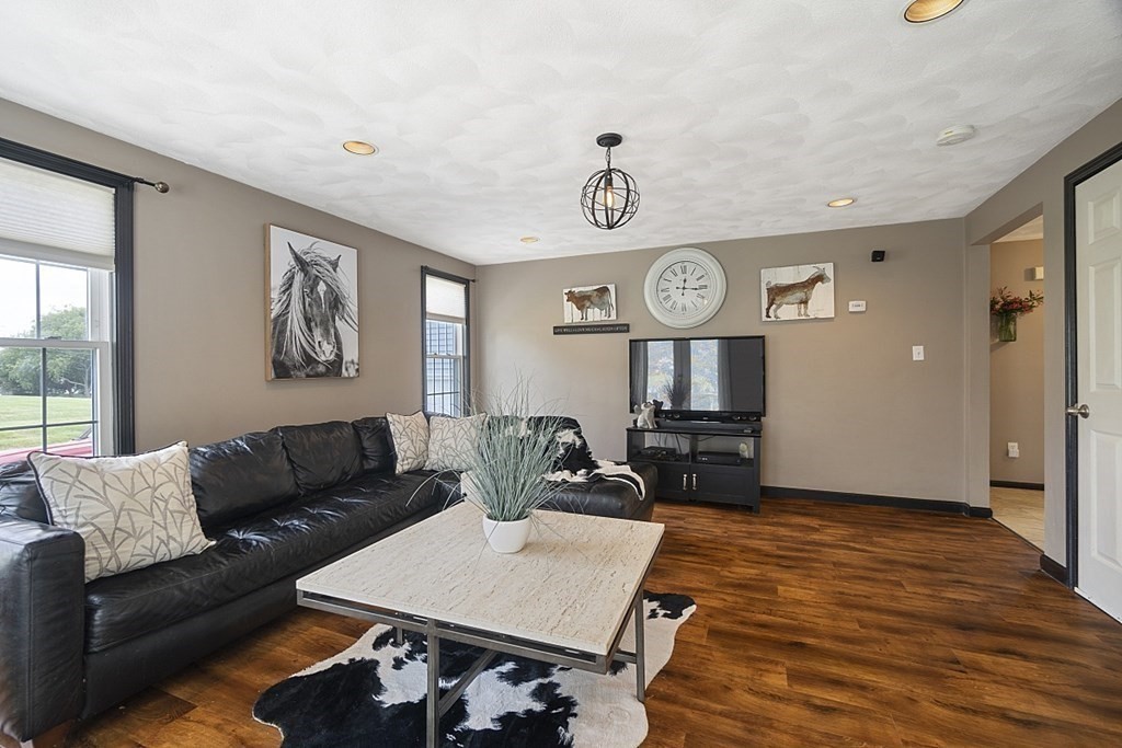 6 Violet Road Billerica, MA 01821 - Photo 12 of 42 a living room with furniture and a large window