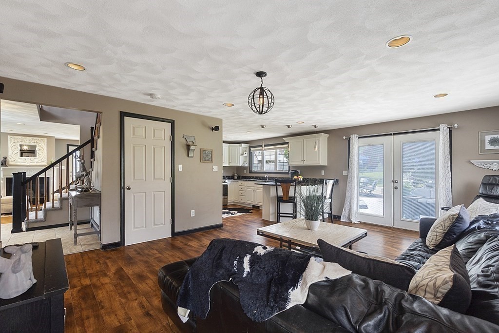6 Violet Road Billerica, MA 01821 - Photo 14 of 42 a living room with furniture a table and chairs