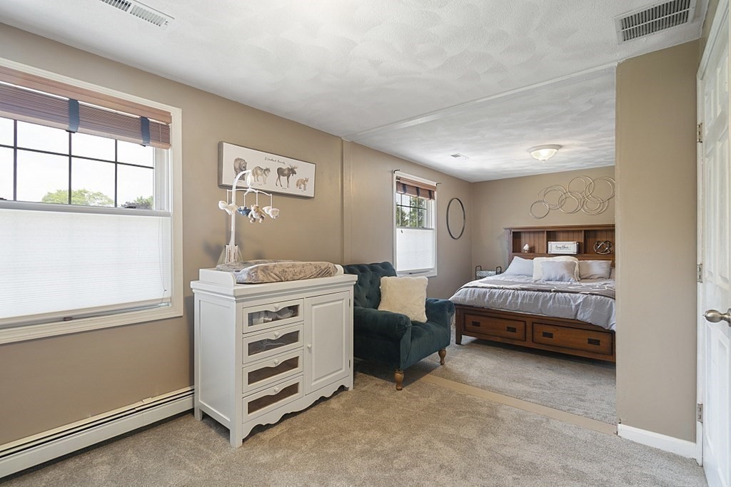 6 Violet Road Billerica, MA 01821 - Photo 24 of 42 a bedroom with a bed and a window