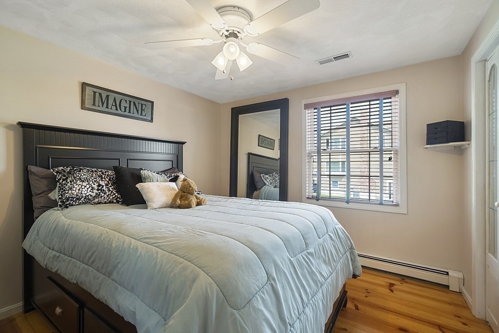 6 Violet Road Billerica, MA 01821 - Photo 27 of 42 a bedroom with a bed and a window