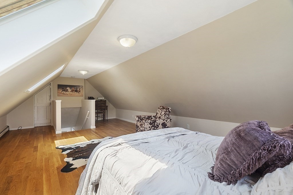 6 Violet Road Billerica, MA 01821 - Photo 31 of 42 a bedroom with a bed and a view of bathroom