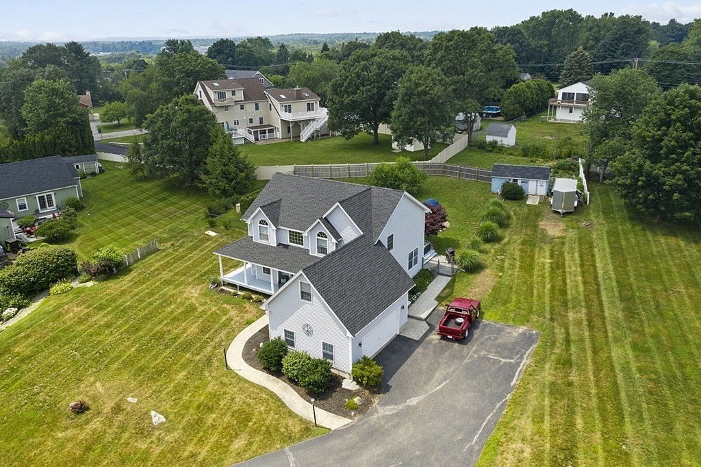 6 Violet Road Billerica, MA 01821 - Photo 42 of 42 an aerial view of a house with a garden