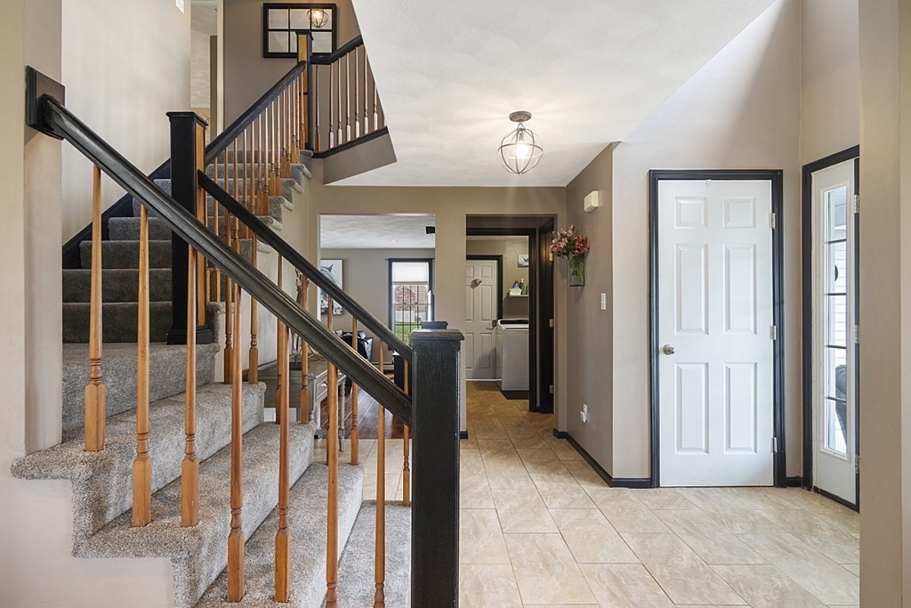 6 Violet Road Billerica, MA 01821 - Photo 5 of 42 a view of entryway and hall with wooden floor