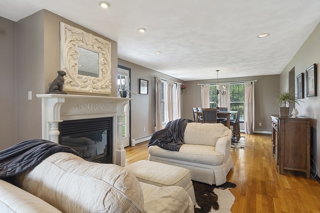 6 Violet Road Billerica, MA 01821 - Photo 6 of 42 a living room with furniture and a fireplace