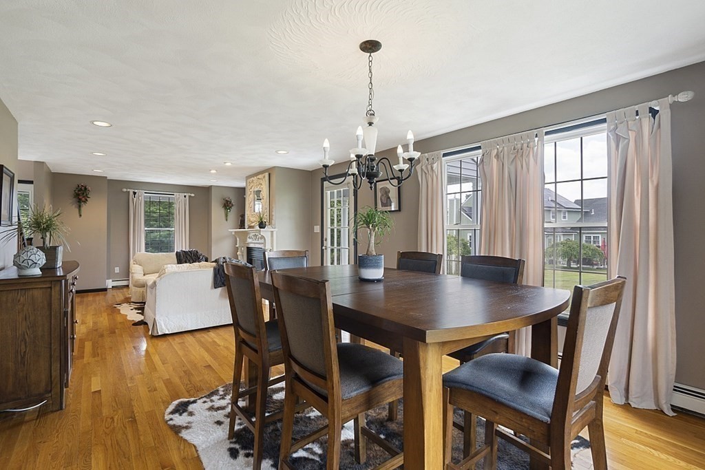 6 Violet Road Billerica, MA 01821 - Photo 8 of 42 a view of a dining room with furniture window and wooden floor