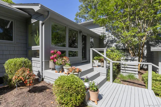 a view of a porch with furniture