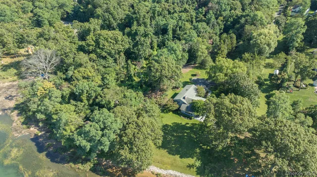 a backyard of a house with a street