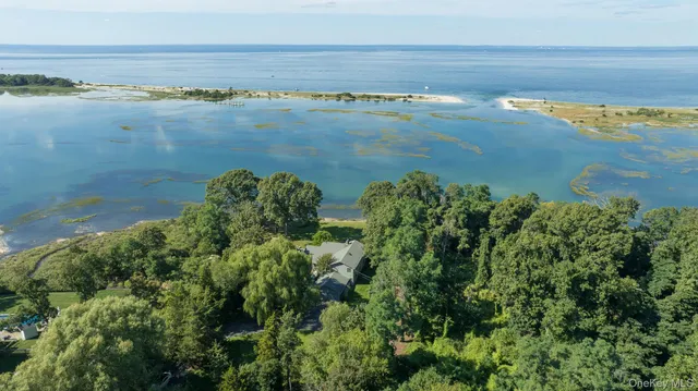 a view of a lake with a yard