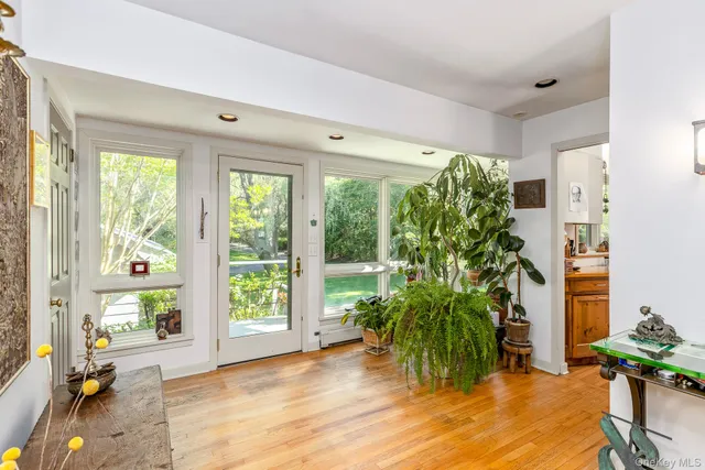 a room with window and garden view