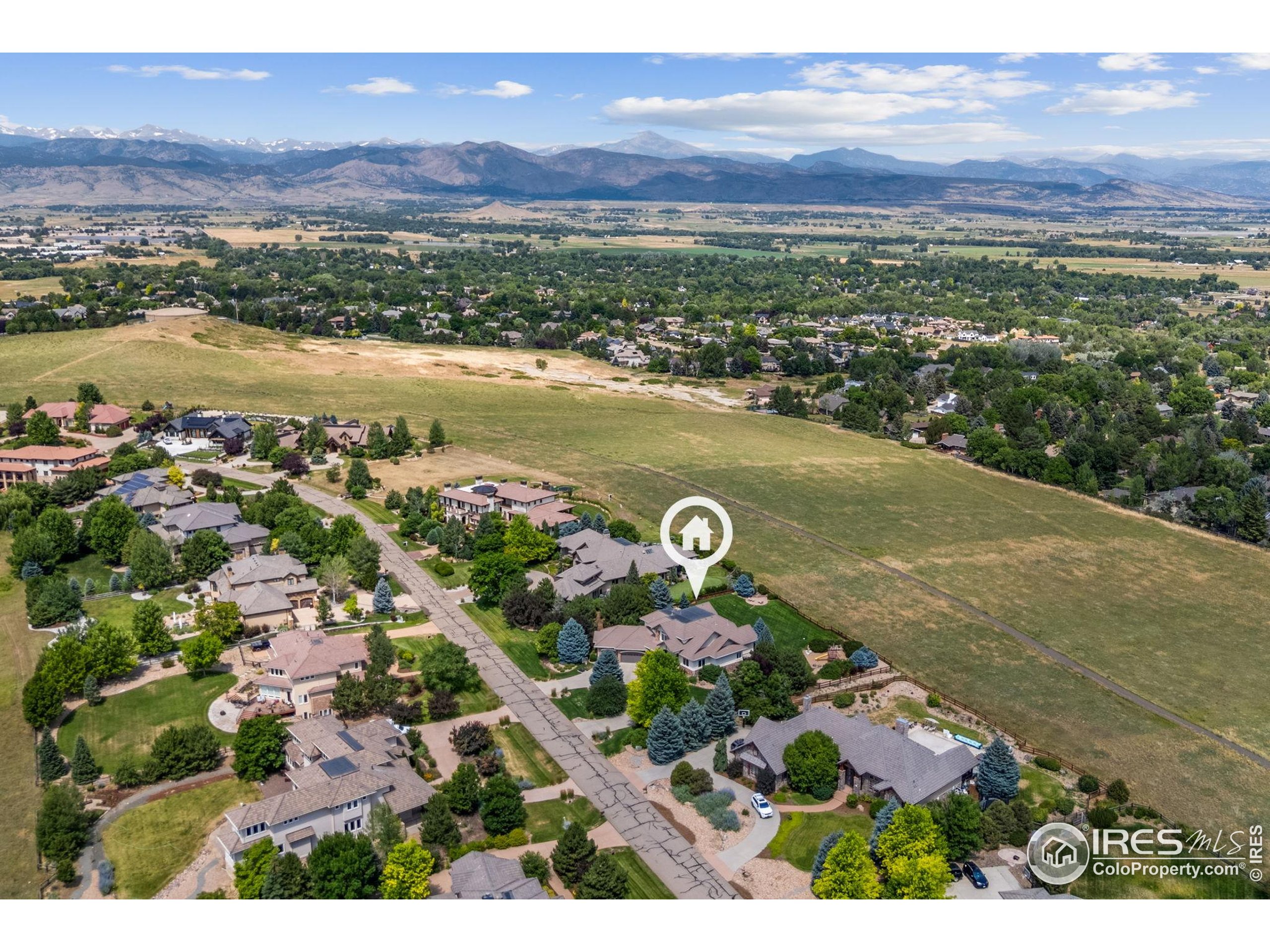 6557 Legend Ridge Trail Niwot, CO 80503 - Photo 33 of 42 a view of a city with an ocean
