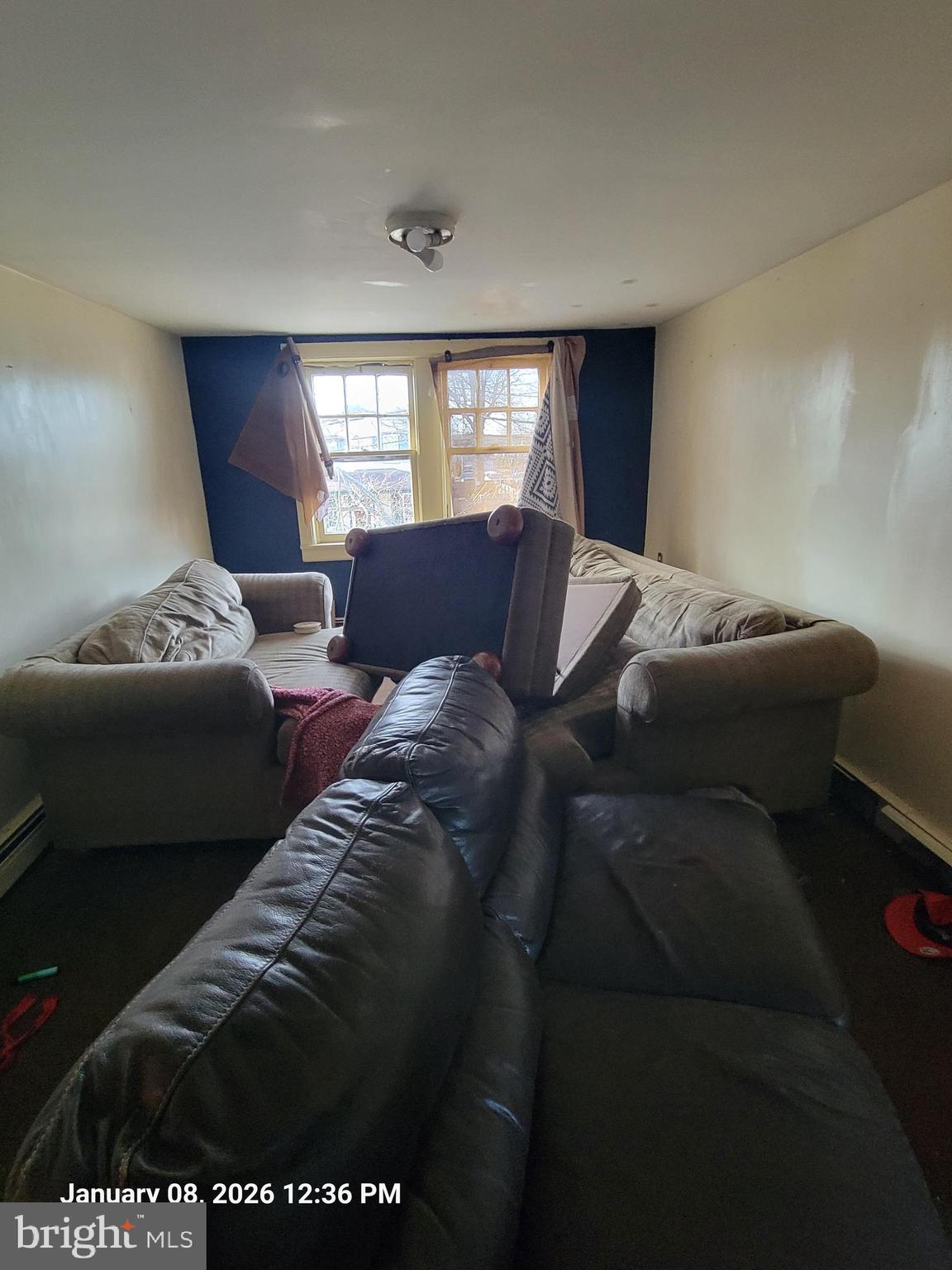 811 Washington Avenue Croydon, PA 19021 - Photo 27 of 35 a living room with a bed and a window