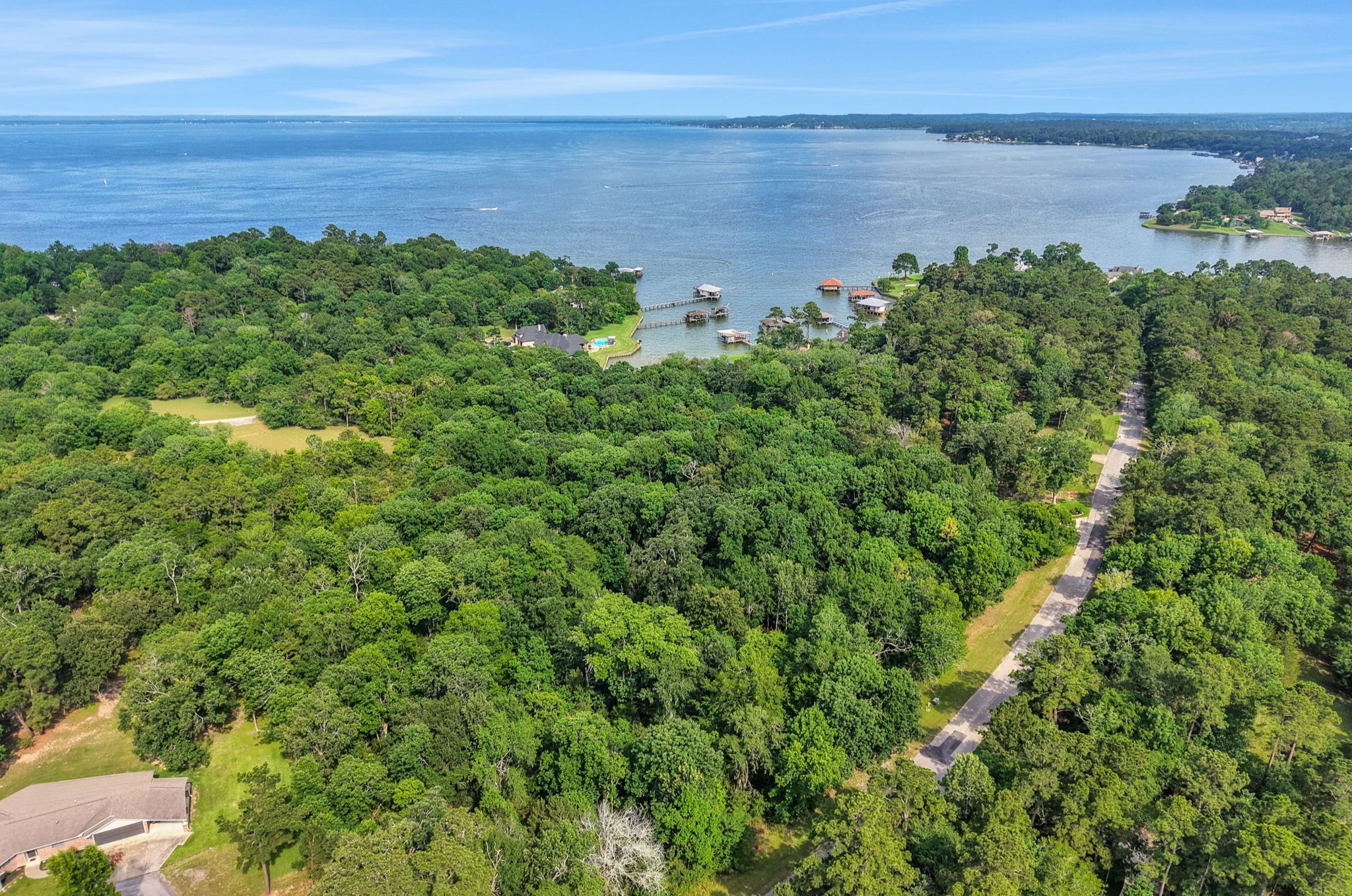 231 Ridge Cove Lane Coldspring, TX 77331 - Photo 46 of 50 Large waterfront tracts are rarely available in Cape Royale, making these 4.9 acres a unique opportunity for lakefront living