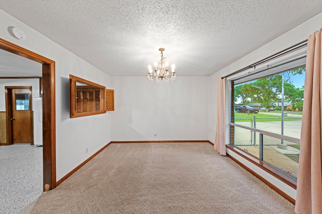133 Oak Way Kerrville, TX 78028 - Photo 11 of 26 a view of empty room with front door