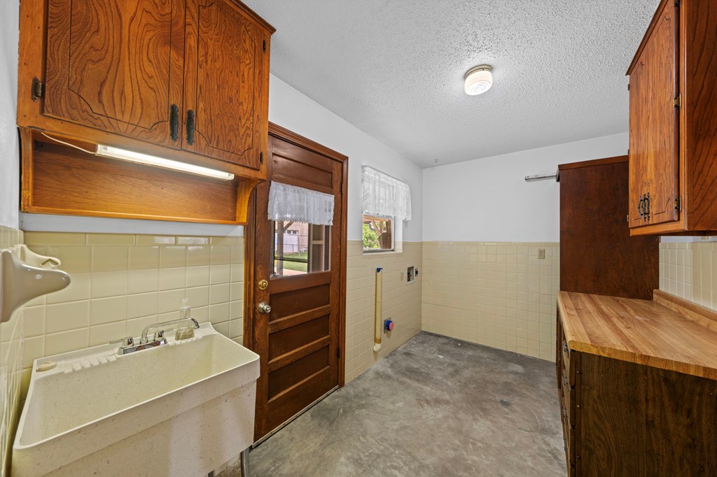 133 Oak Way Kerrville, TX 78028 - Photo 20 of 26 a room with storage and utility