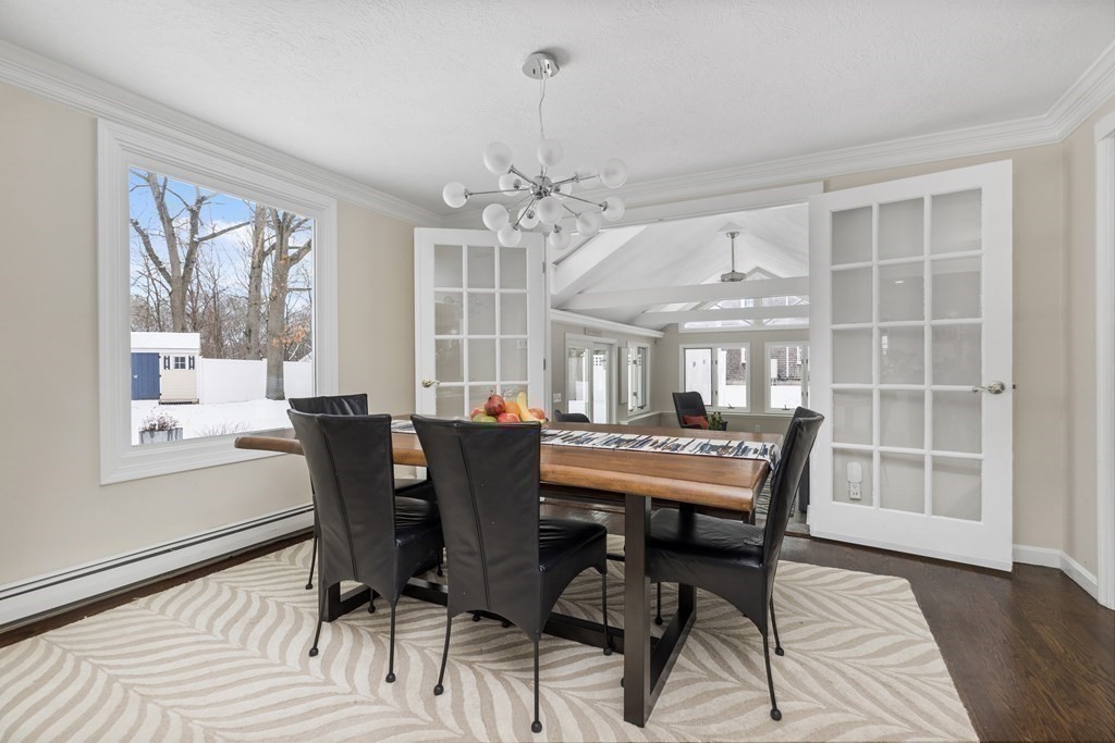 100 Manatee Road Hingham, MA 02043 - Photo 14 of 38 a view of a dining room with furniture window and wooden floor