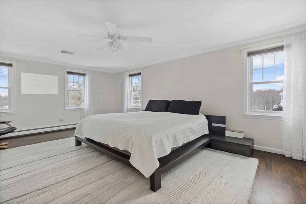 100 Manatee Road Hingham, MA 02043 - Photo 23 of 38 a bedroom with a bed and window