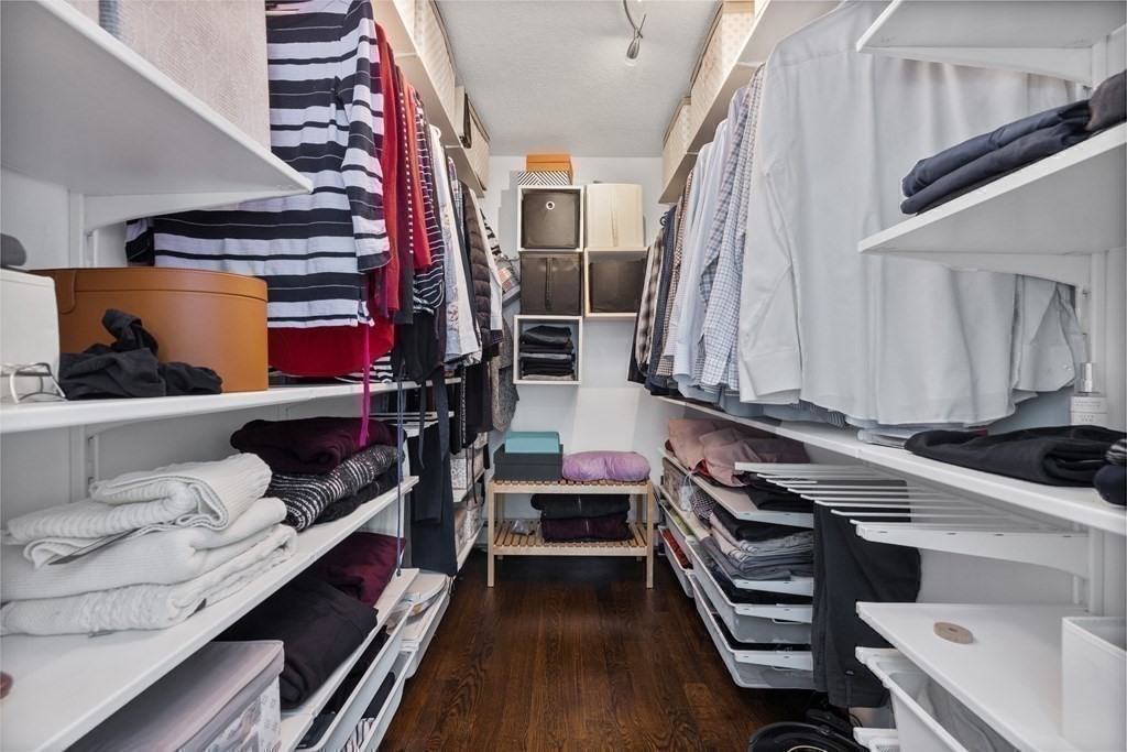 100 Manatee Road Hingham, MA 02043 - Photo 27 of 38 a view of walk in closet with clothes and shoes