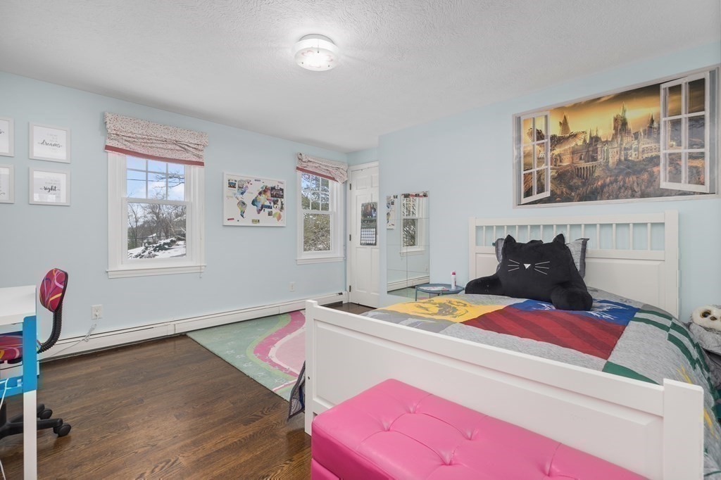 100 Manatee Road Hingham, MA 02043 - Photo 28 of 38 a living room with furniture and wooden floor