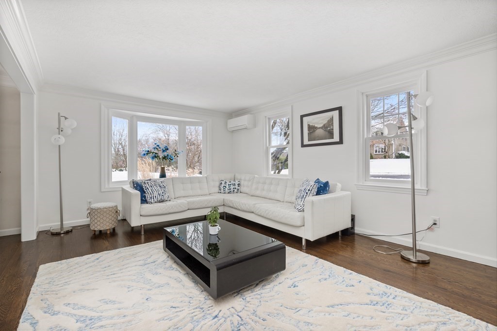 100 Manatee Road Hingham, MA 02043 - Photo 6 of 38 a living room with furniture and a table