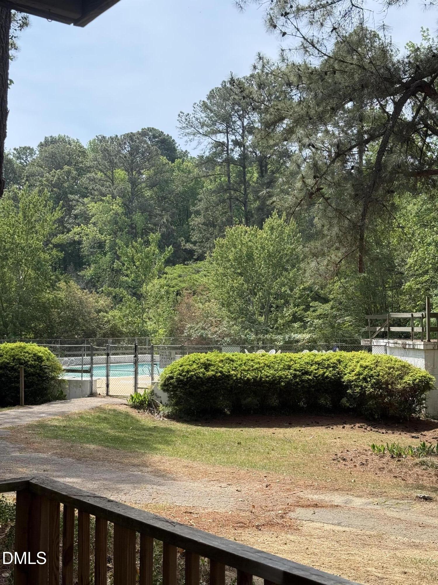 546 Pine Ridge Place Raleigh, NC 27609 - Photo 23 of 28 a view of a yard with an outdoor space