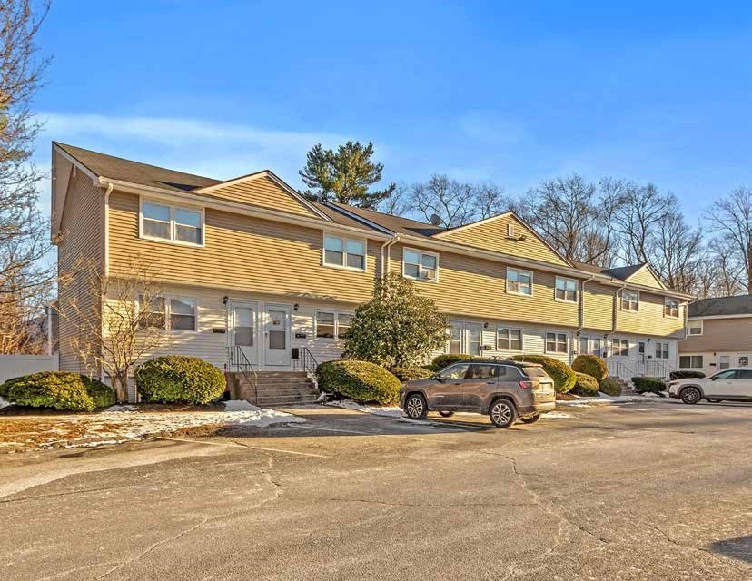 174 Pine Street Holbrook, MA 02343 - Photo 6 of 24 a couple of cars parked in front of a building
