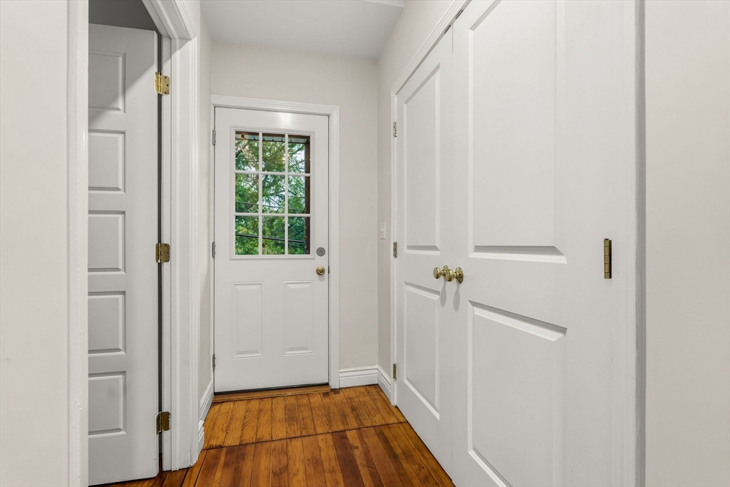 8 1/2 Intervale Street, Unit 10 1/2 Quincy, MA 02169 - Photo 13 of 16 a view of a room with wooden floor and a bathroom