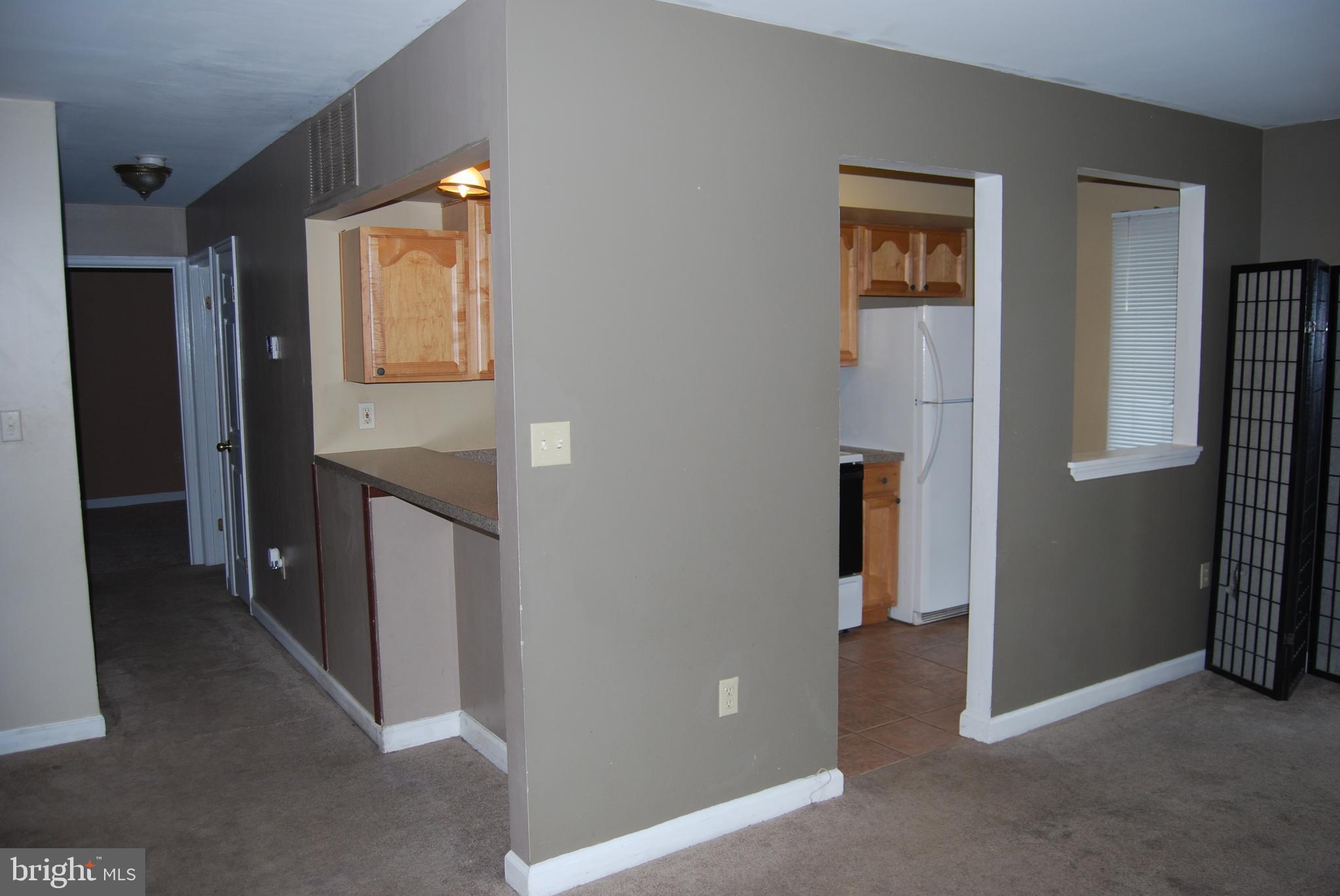 6710 Ridge Road, Unit 102 Baltimore, MD 21237 - Photo 11 of 27 Kitchen Opens to Dining Room!