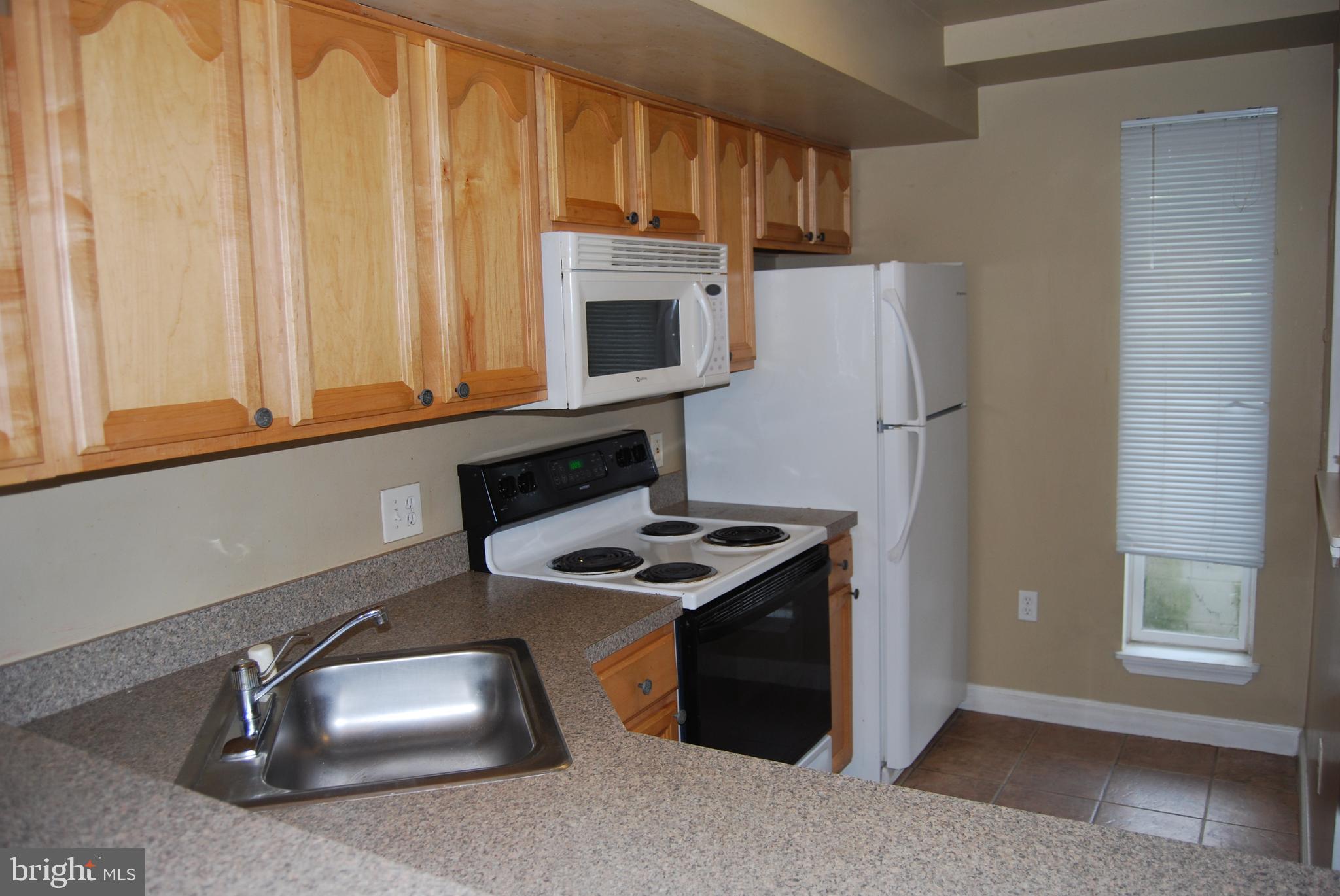 6710 Ridge Road, Unit 102 Baltimore, MD 21237 - Photo 13 of 27 Built In Microwave!