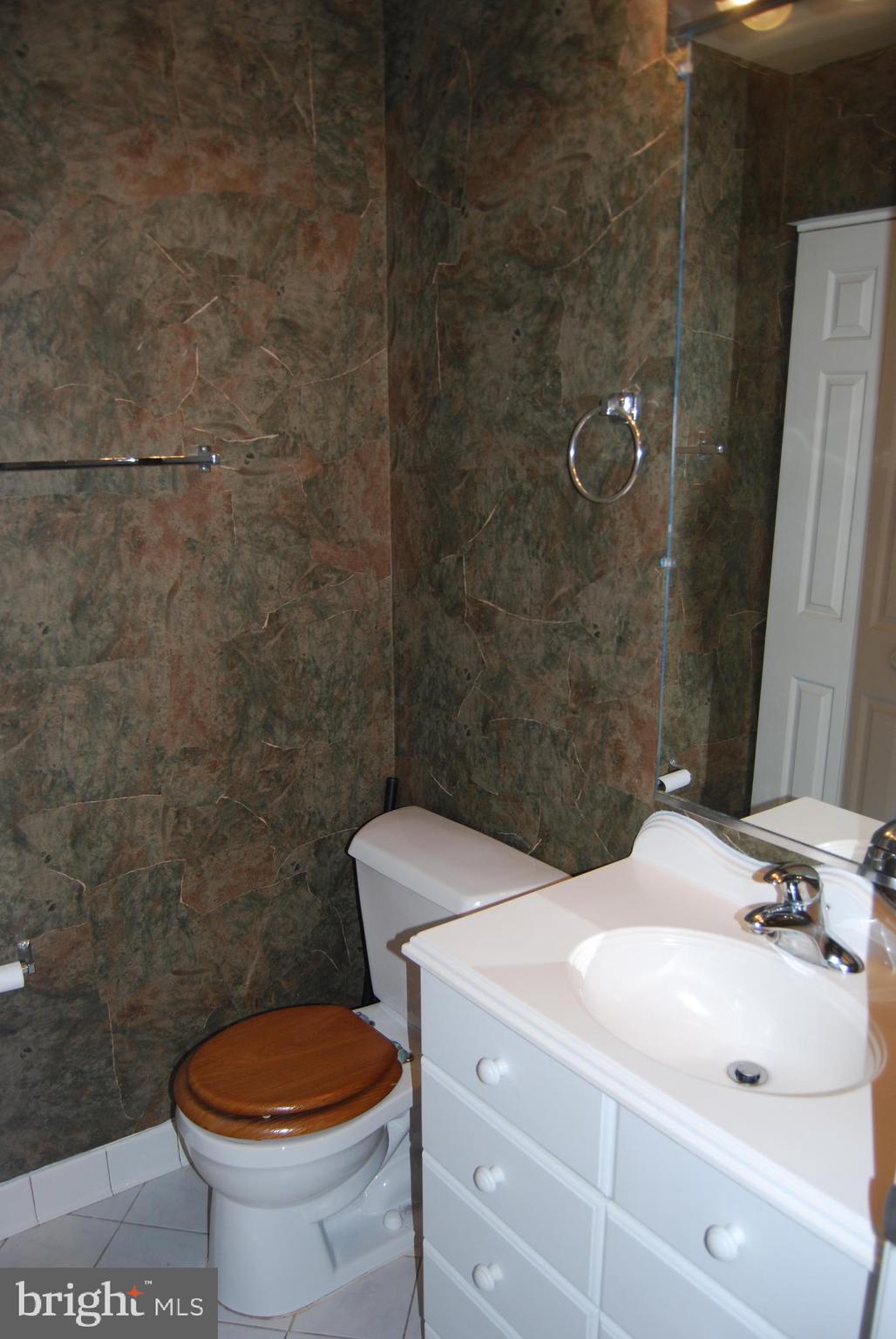 6710 Ridge Road, Unit 102 Baltimore, MD 21237 - Photo 26 of 27 Half Bath!