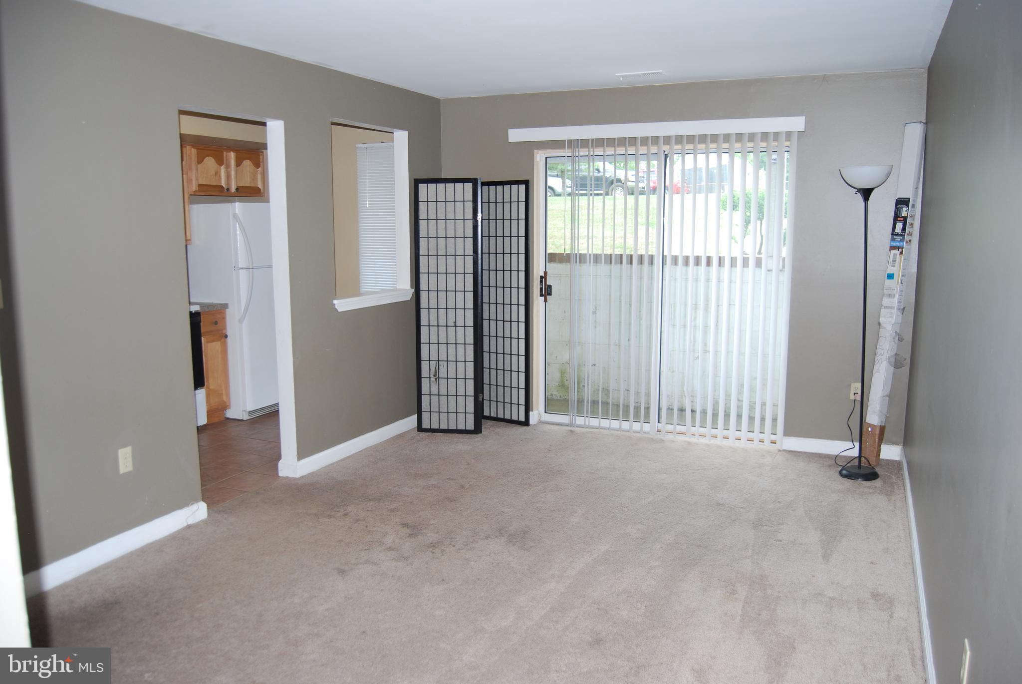 6710 Ridge Road, Unit 102 Baltimore, MD 21237 - Photo 6 of 27 Living Room! Slider to Private Patio!