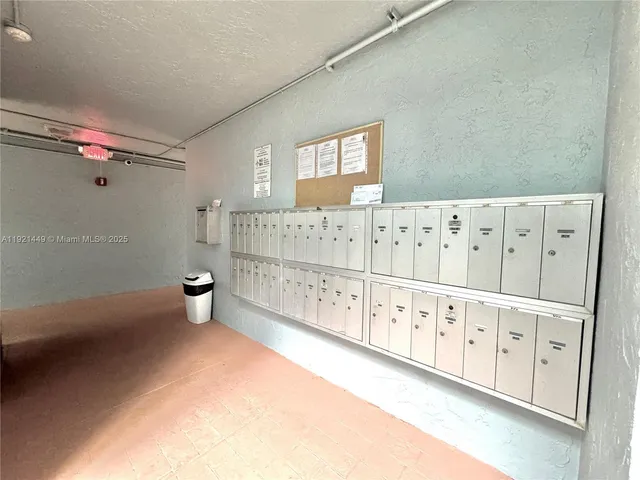 a view of wooden floor and bathroom