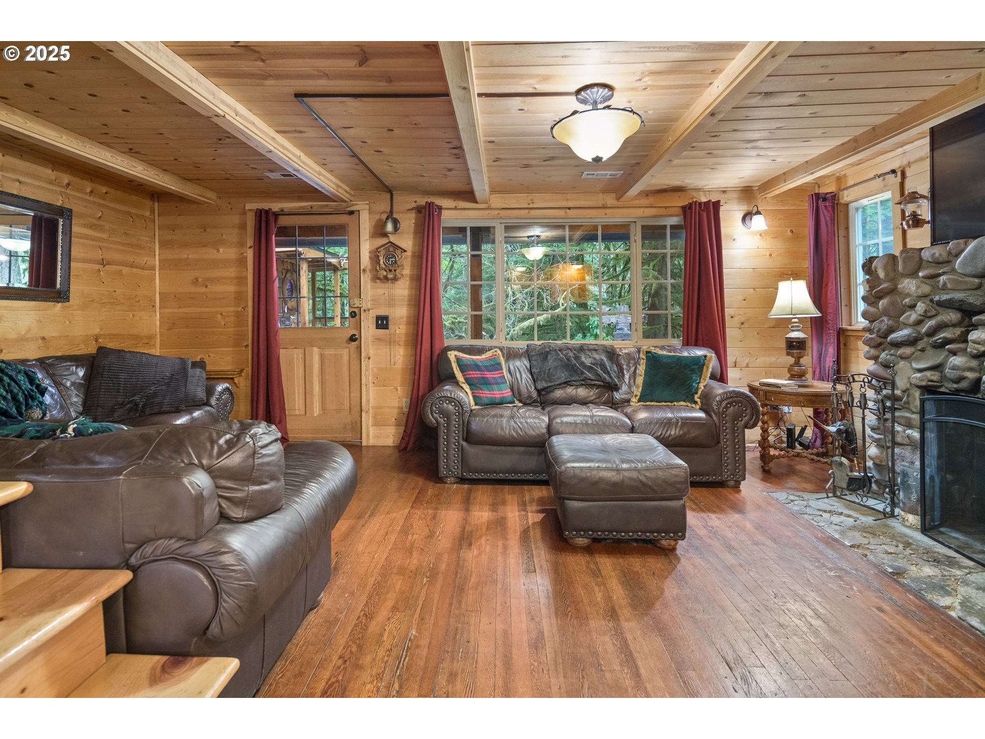27172 East Marion Road Rhododendron, OR 97049 - Photo 12 of 48 a living room with furniture and a large window