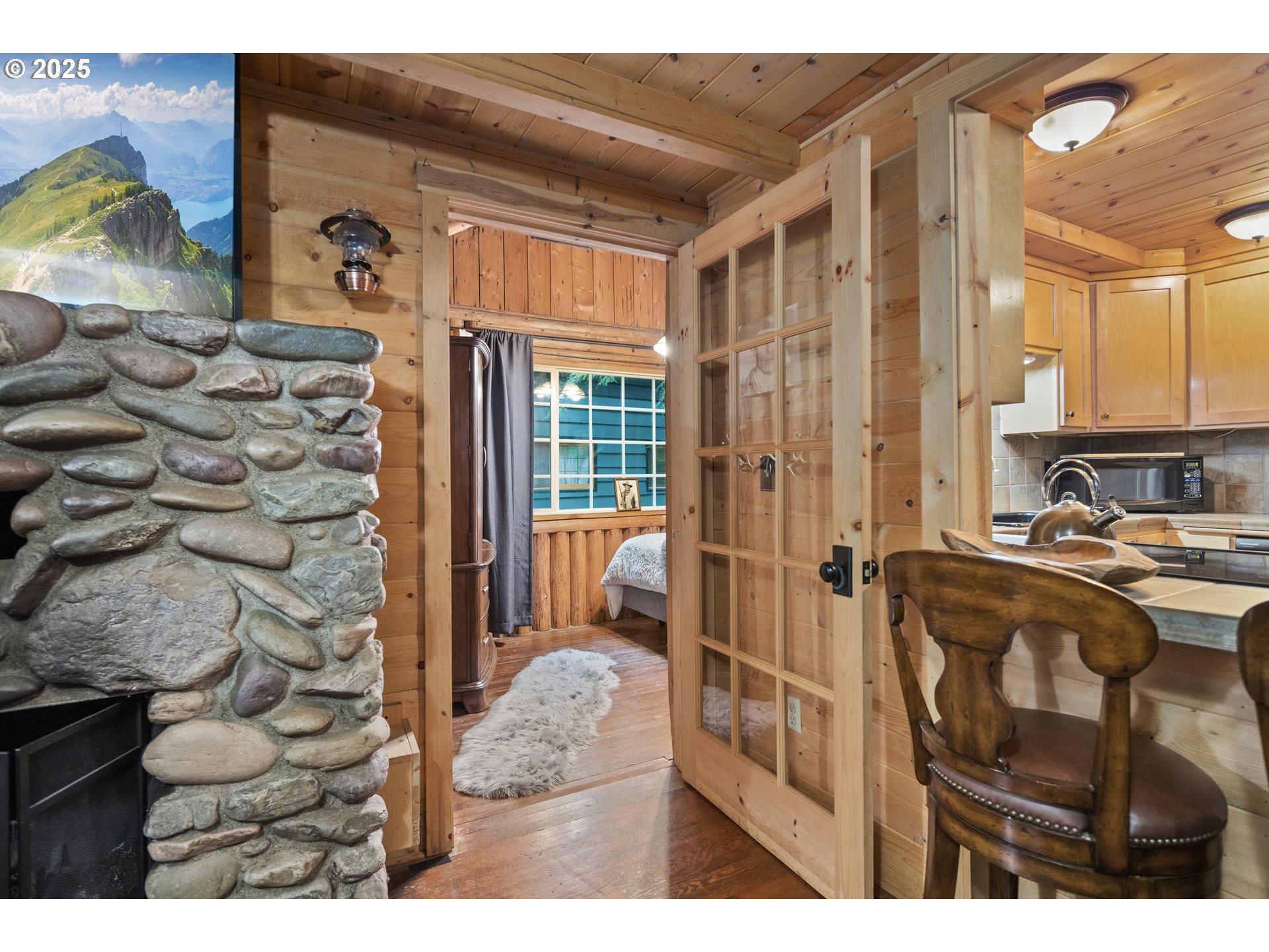 27172 East Marion Road Rhododendron, OR 97049 - Photo 13 of 48 a living room with a couch and a table