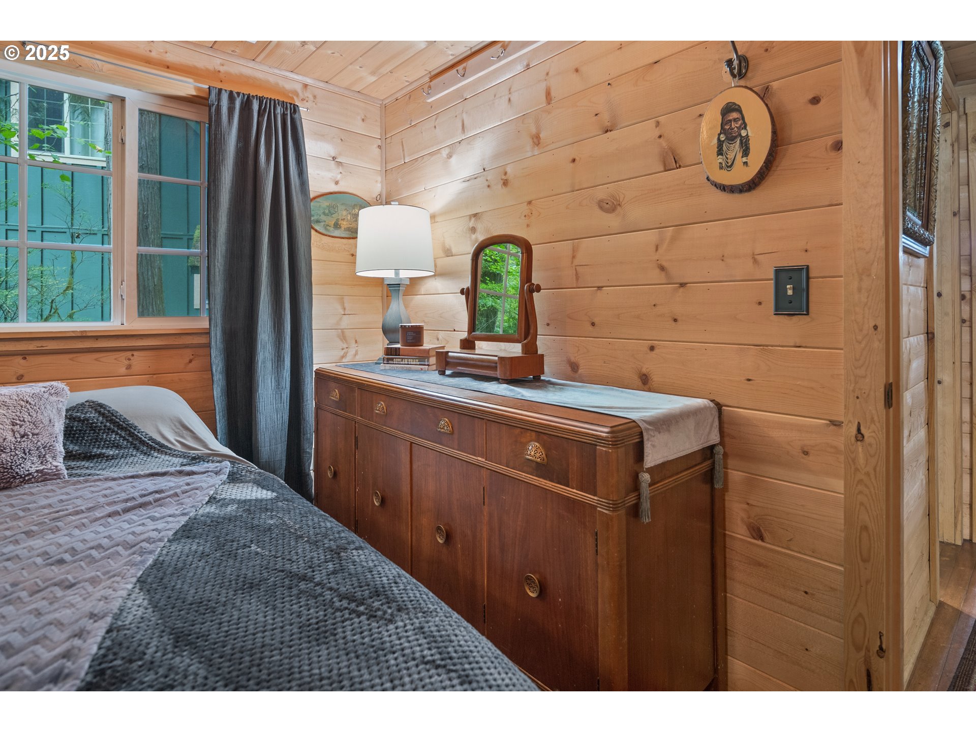27172 East Marion Road Rhododendron, OR 97049 - Photo 16 of 48 a bedroom with a bed and a dresser