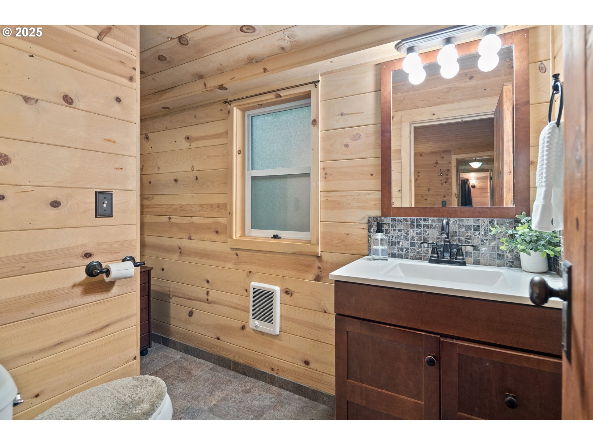 27172 East Marion Road Rhododendron, OR 97049 - Photo 19 of 48 a bathroom with a sink and a mirror