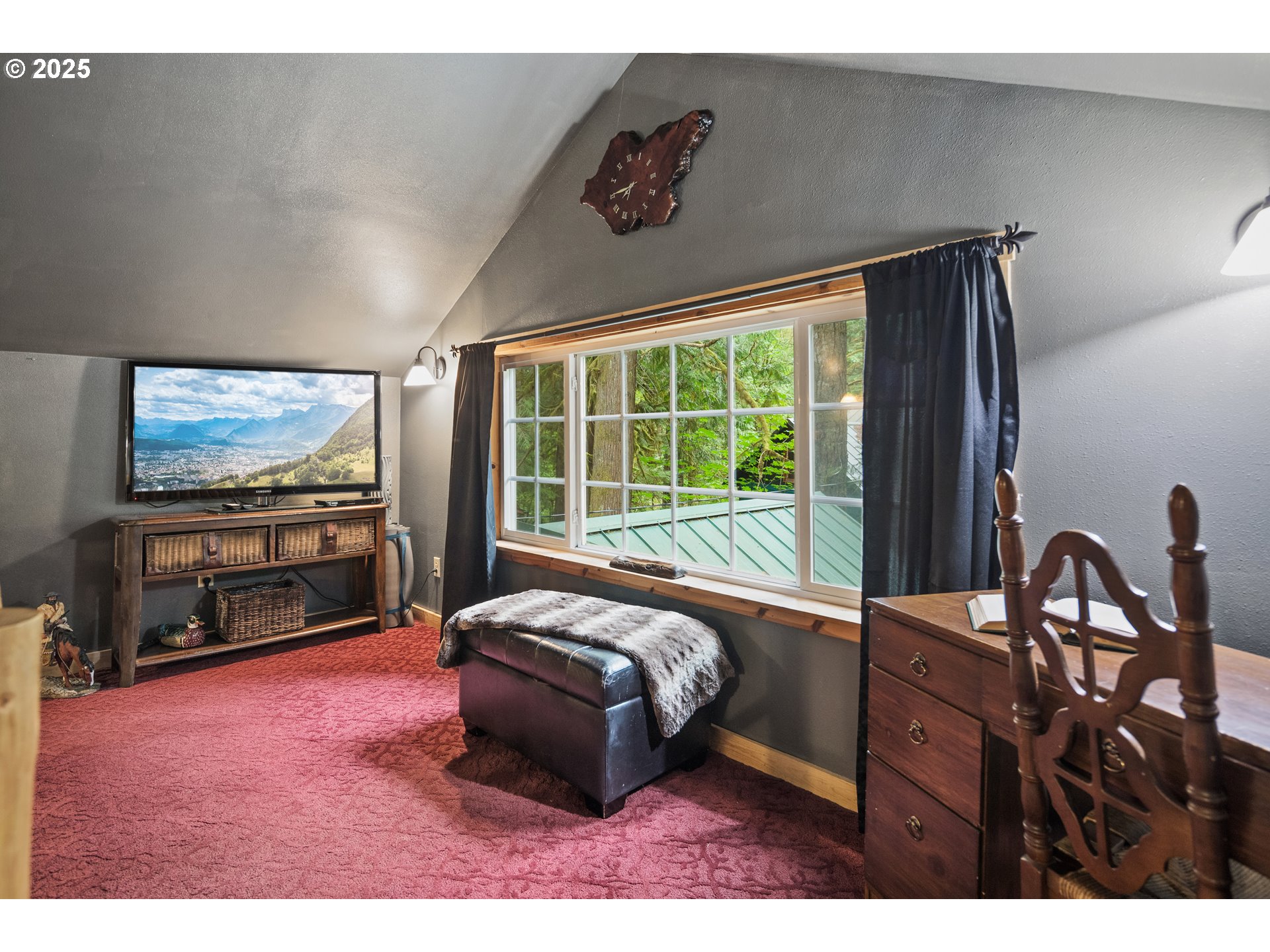 27172 East Marion Road Rhododendron, OR 97049 - Photo 21 of 48 a living room with furniture and a flat screen tv