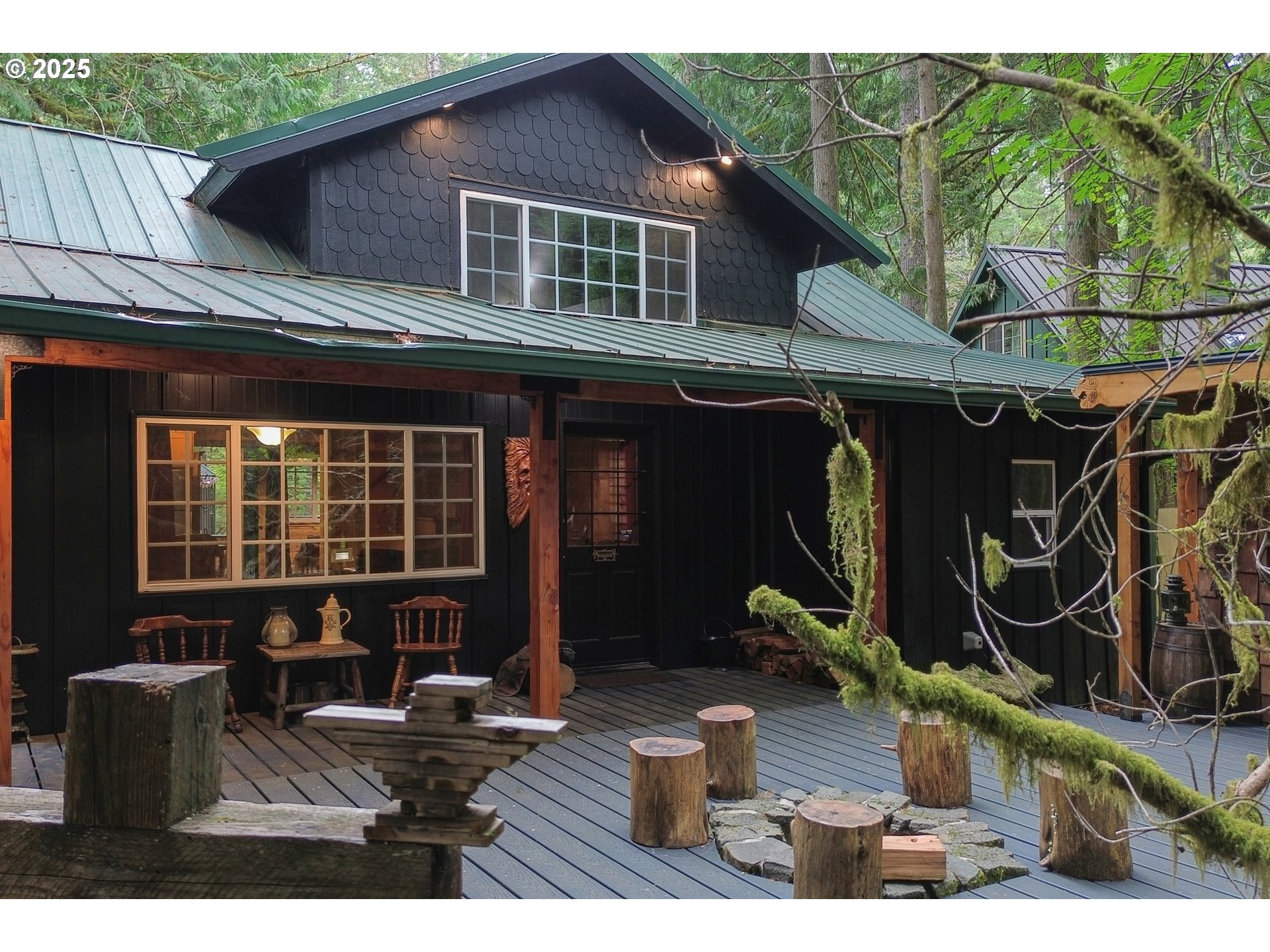 27172 East Marion Road Rhododendron, OR 97049 - Photo 29 of 48 a backyard of a house with seating space