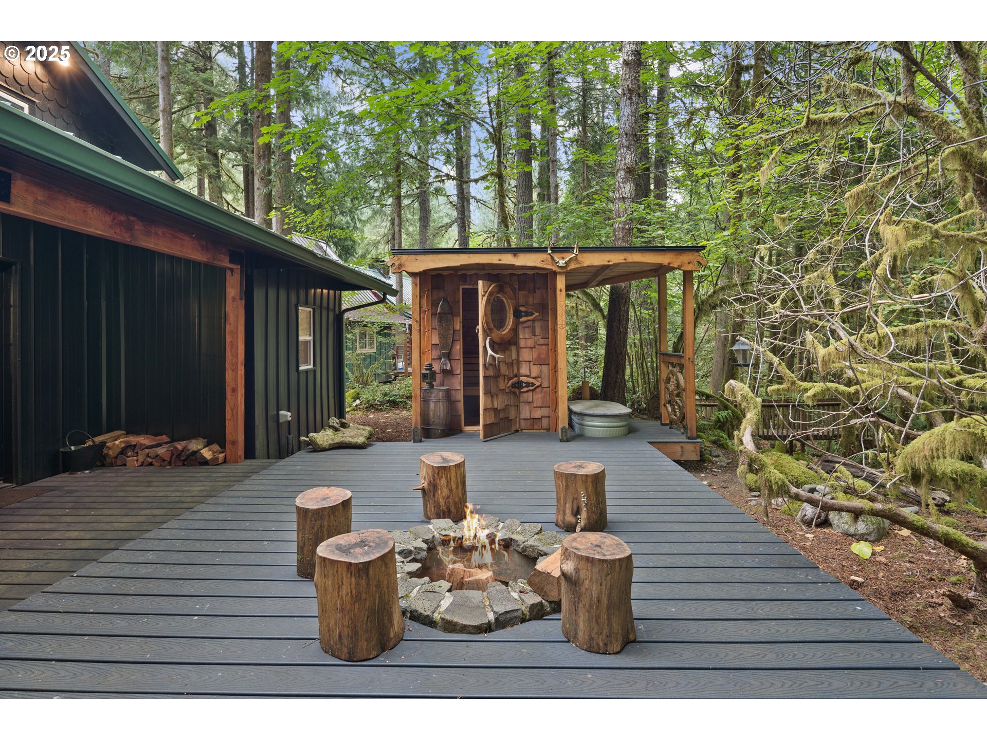 27172 East Marion Road Rhododendron, OR 97049 - Photo 31 of 48 a view of a patio with lawn chairs and wooden floor
