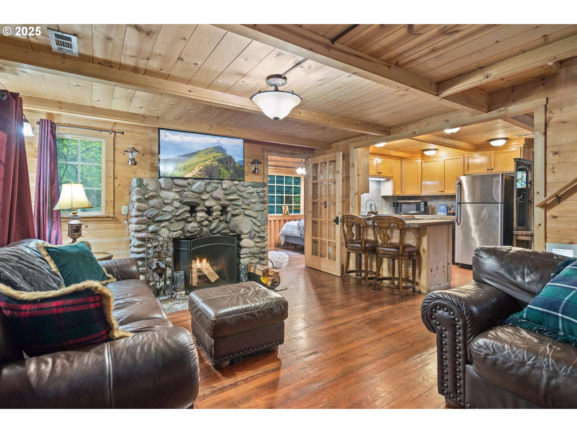 27172 East Marion Road Rhododendron, OR 97049 - Photo 6 of 48 a living room with furniture and a fireplace