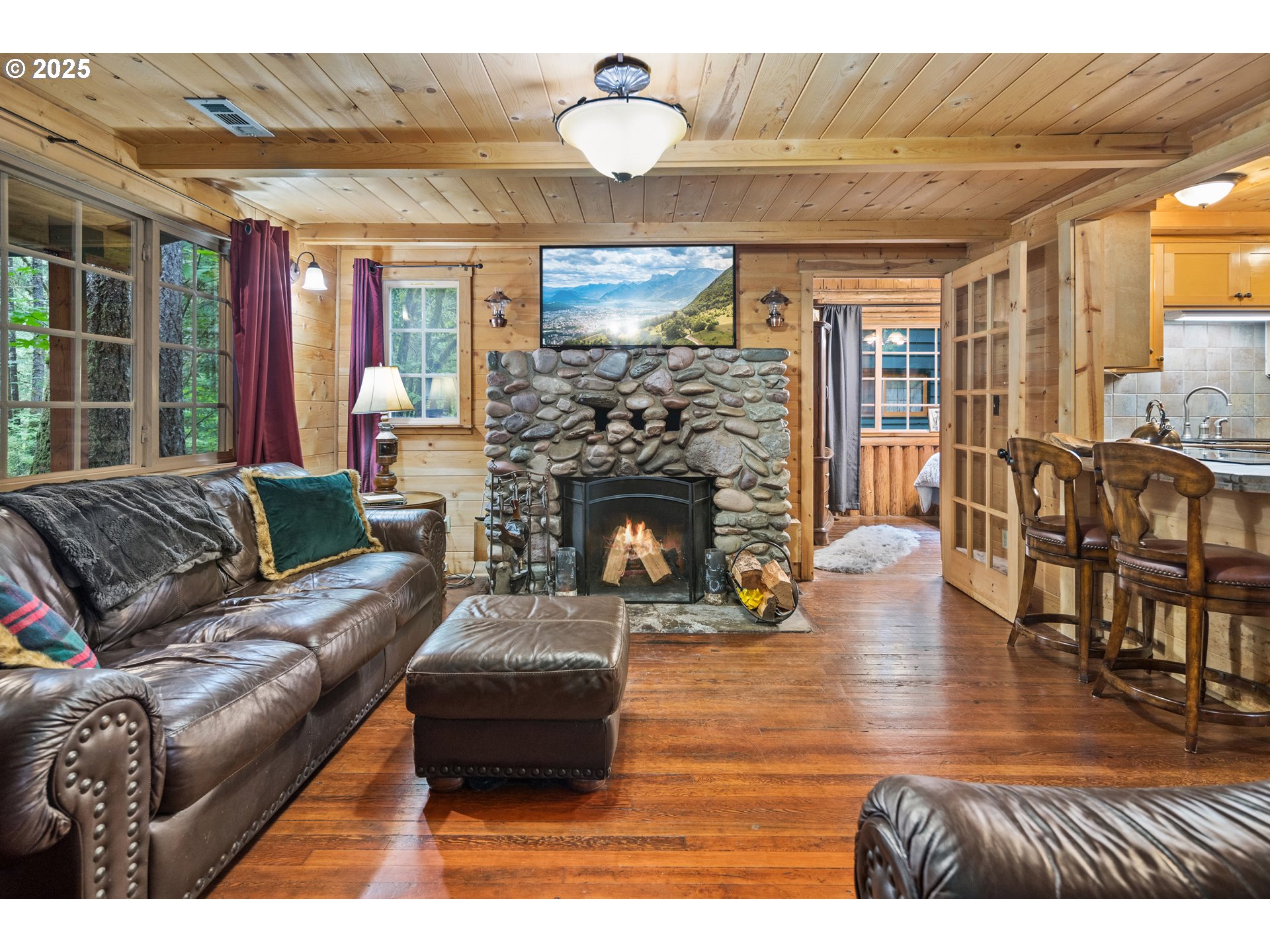 27172 East Marion Road Rhododendron, OR 97049 - Photo 9 of 48 a living room with furniture and a fireplace
