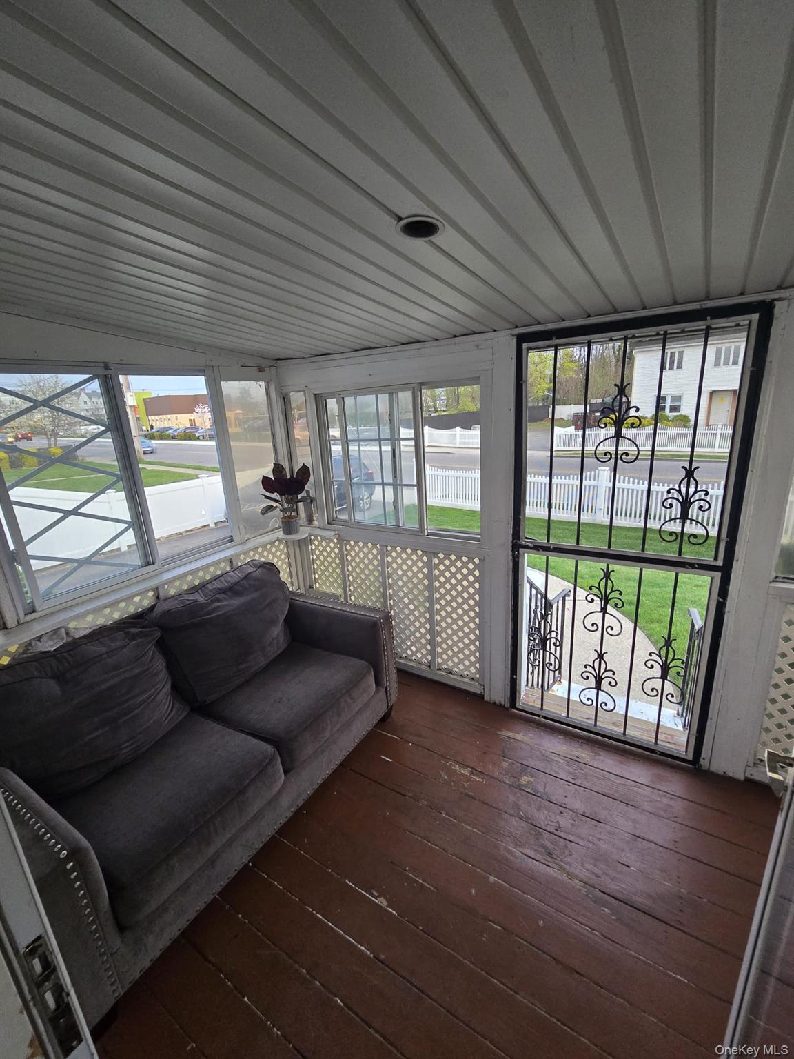 2 Ritter Avenue Amityville, NY 11701 - Photo 21 of 26 a living room with furniture and a large window