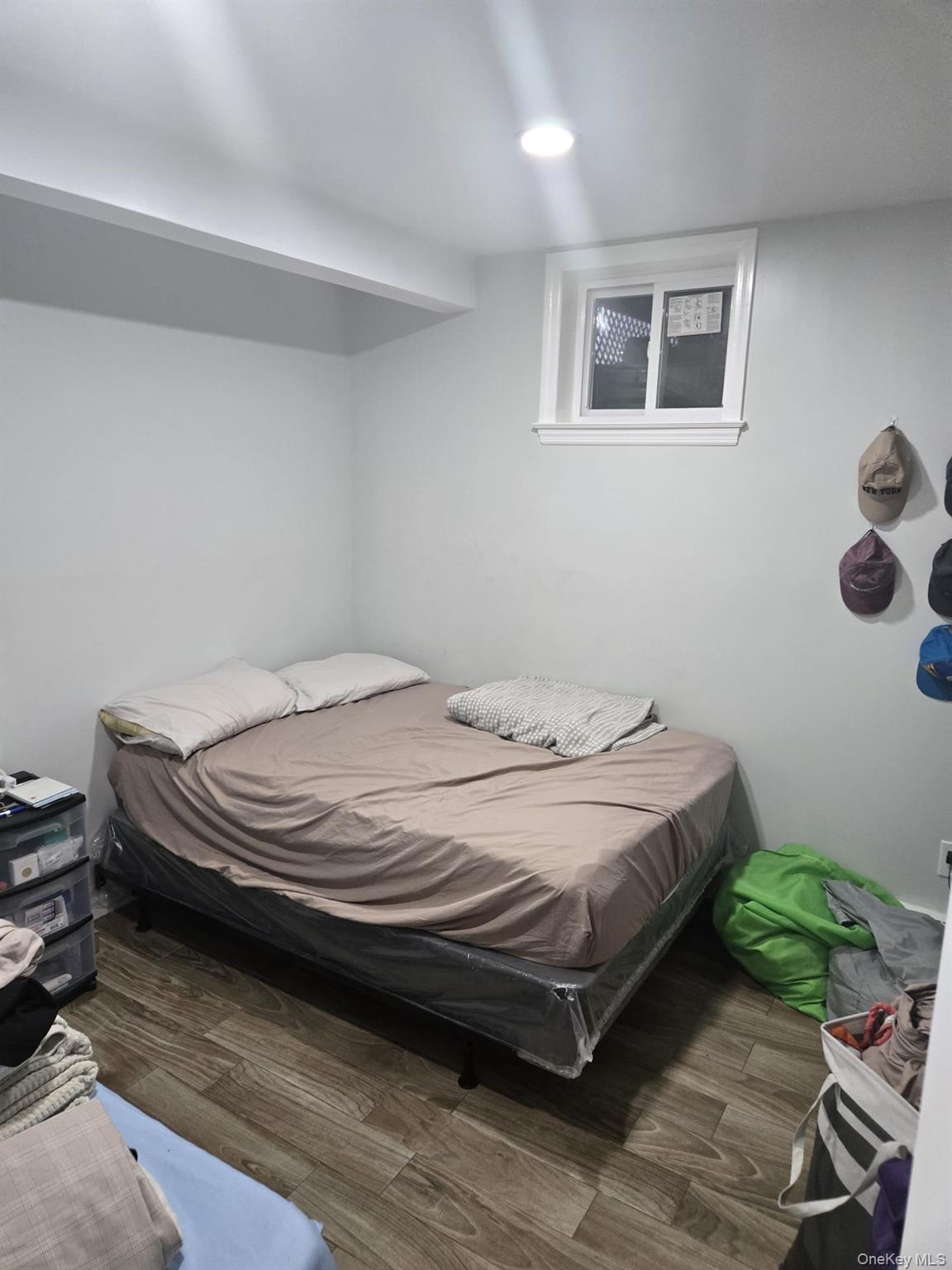 2 Ritter Avenue Amityville, NY 11701 - Photo 26 of 26 a bedroom with a bed table and chair