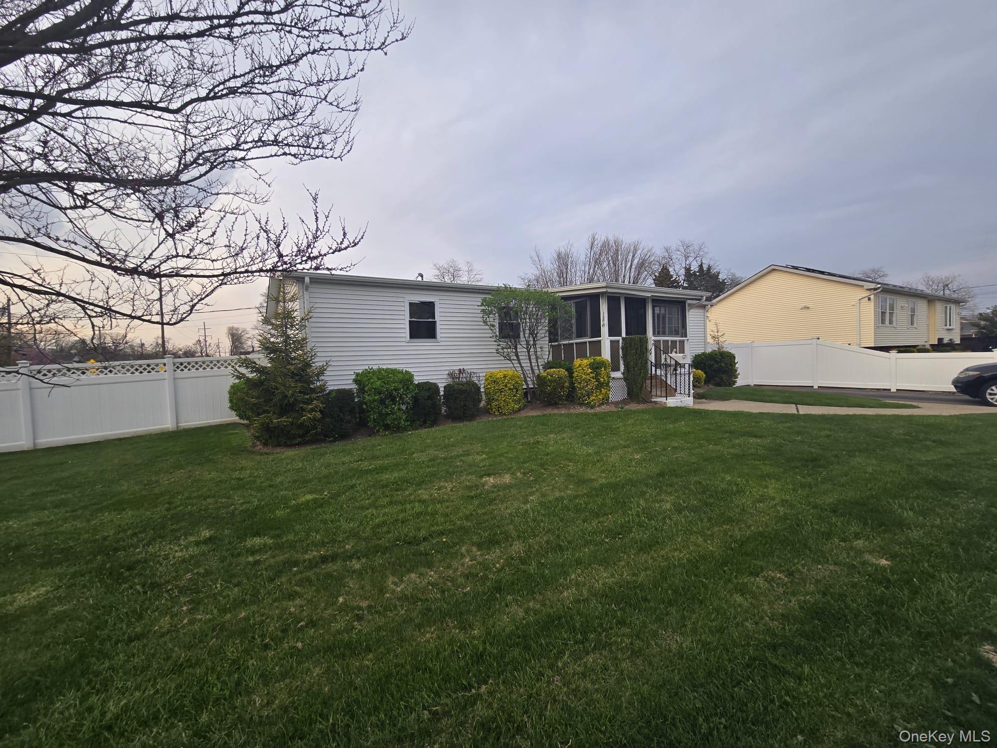 2 Ritter Avenue Amityville, NY 11701 - Photo 3 of 26 a view of a house with a backyard