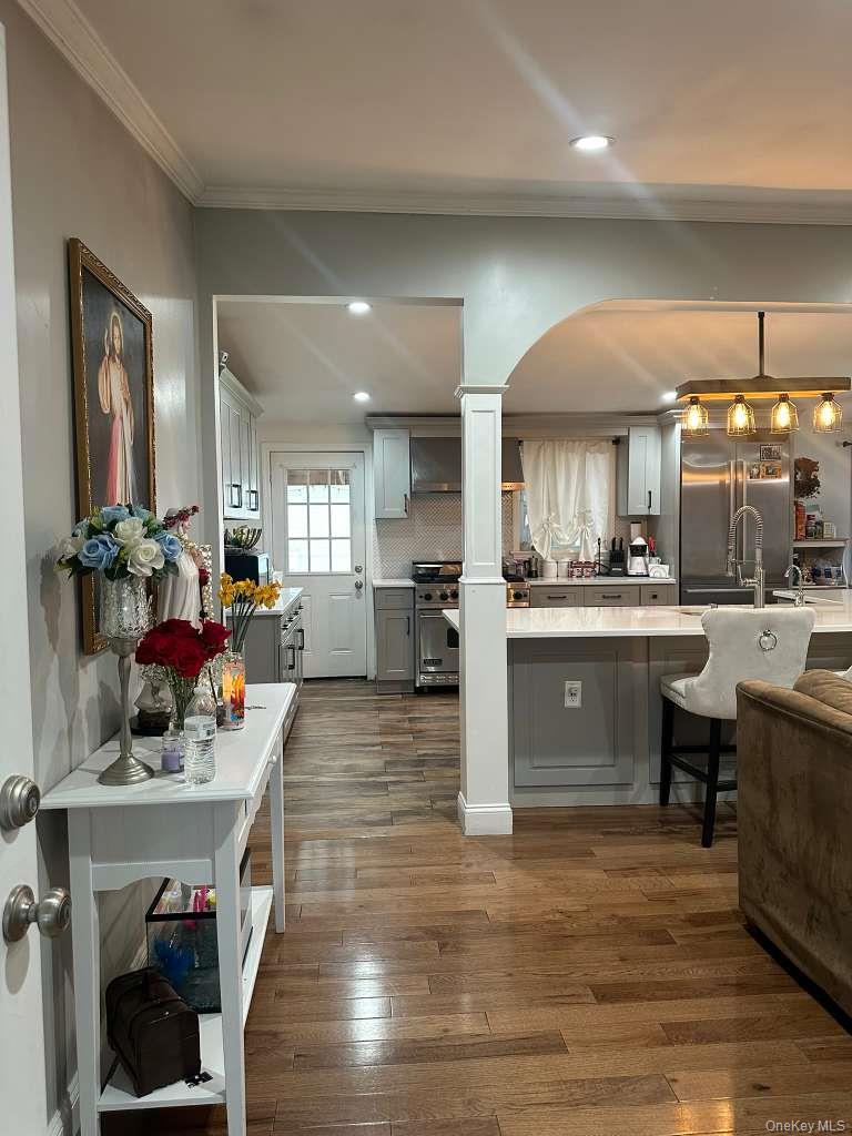 2 Ritter Avenue Amityville, NY 11701 - Photo 10 of 26 a kitchen with a sink appliances and cabinets